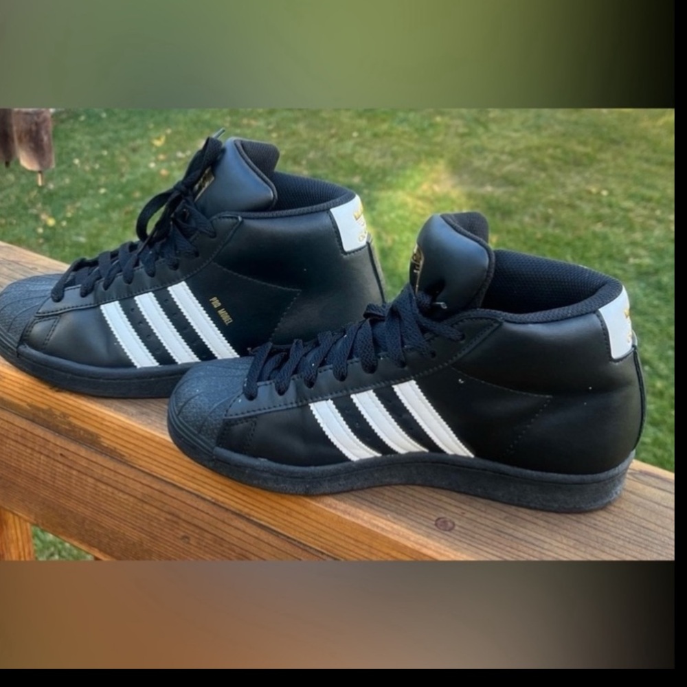 Adidas pro-model high top sneakers.